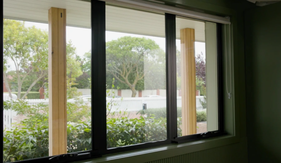 Technician cleaning interior windows in San Clemente